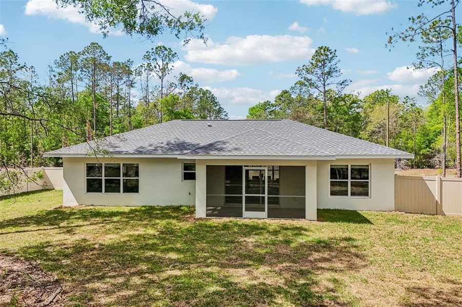 Exterior details and patio area of a home in , Citrus Springs (Image 37).