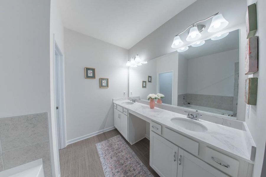 Furnished interior view inside a new home in Ellison Square, Sugar Hill (Image 9).