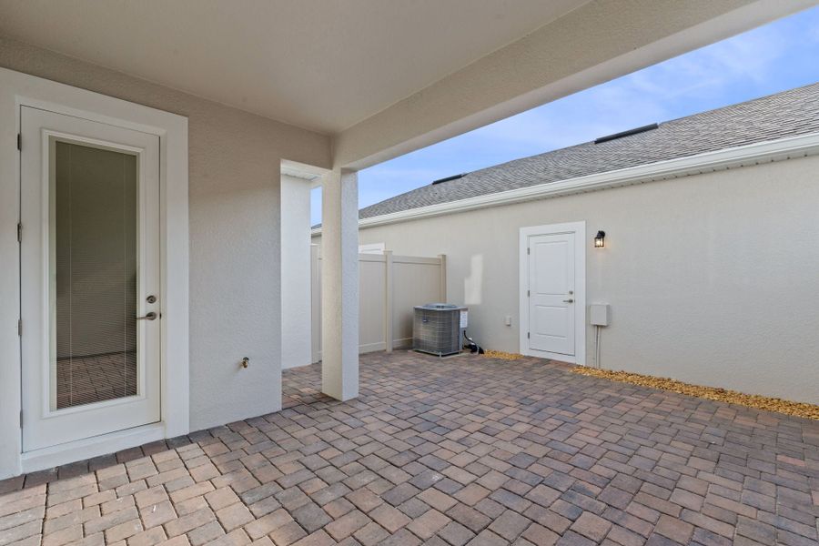 Representative exterior details of a home built from the Edison by Rockwell Homes in Harvest at Ovation - Townhomes, Winter Garden (Image 48). Representative exterior details of a home built from the Edison by Rockwell Homes in Harvest at Ovation - Townhomes, Winter Garden (Image 48).