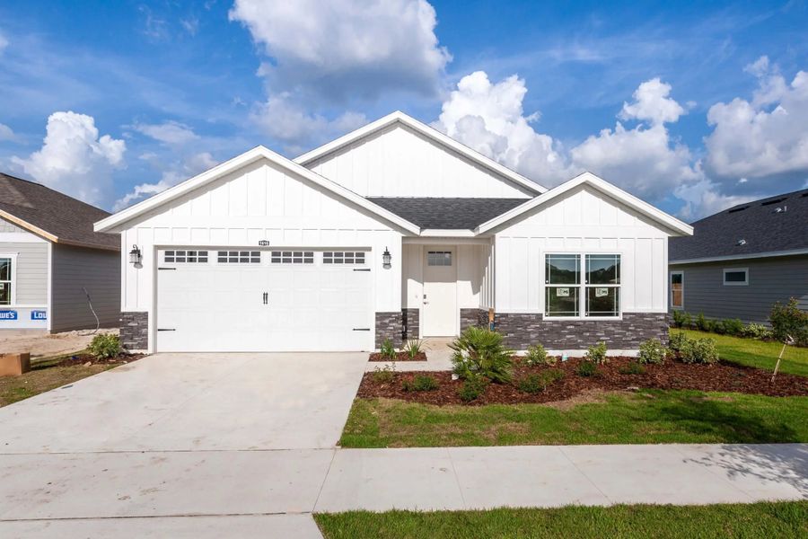 Representative exterior photo of a completed home built from the Thomas by William Weseman Construction in Grand Oaks, Gainesville, FL (Image 14).