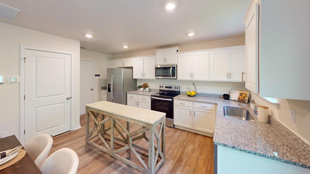 Furnished interior view inside a new home in Cardinal Creek, Charlotte (Image 3).