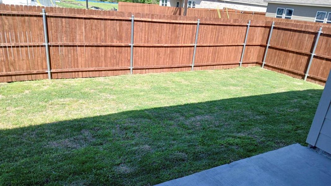 Exterior details and patio area of a home in Labein Villas, Greenville (Image 2). Exterior details and patio area of a home in Labein Villas, Greenville (Image 2).