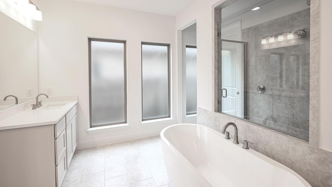 Furnished interior view inside a new home in Crosswinds 50', Kyle (Image 9).