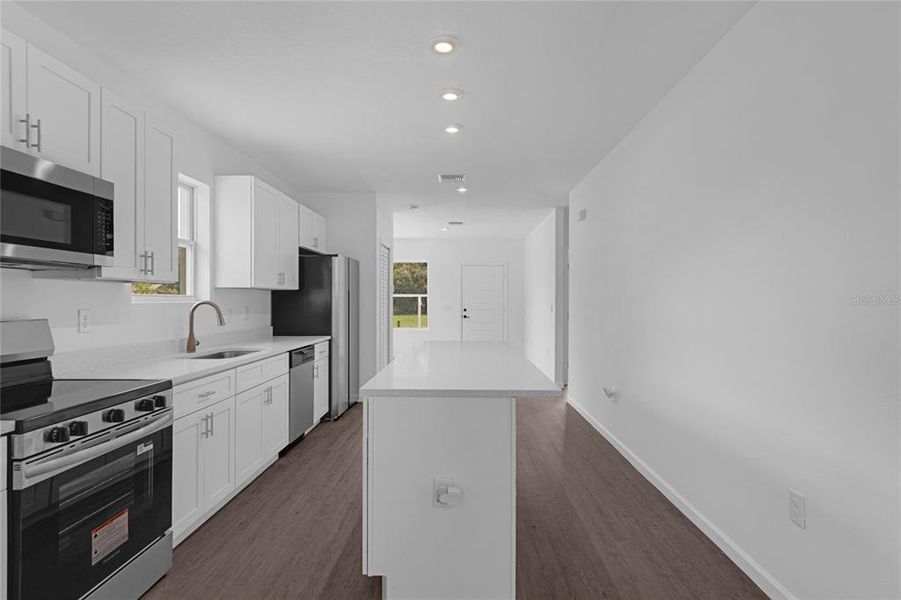 Open floor plan with living room and a family room