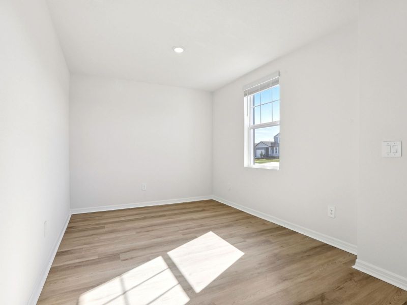 Spacious, unfurnished interior of a new home in The Grove at Stuart Crossing - Classic Series, Bartow (Image 13).