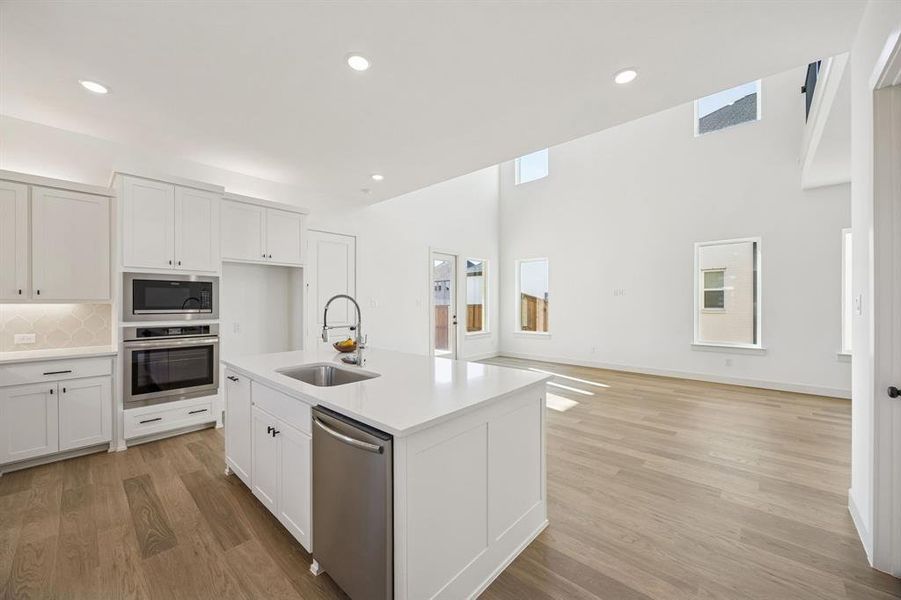 The chef will never be left out of the party in this dream kitchen!