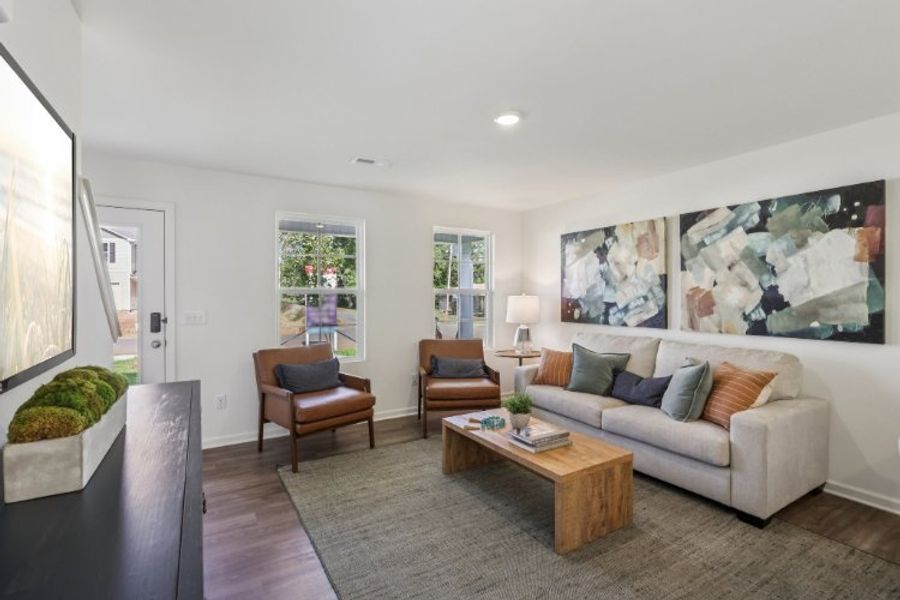 A living room with a couch and a coffee table.