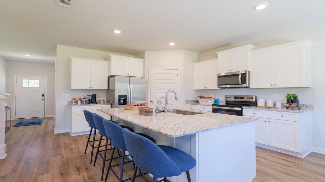 Representative furnished interior of a home built from the The Carol by D.R. Horton in Misting Springs, Crawfordville (Image 7).