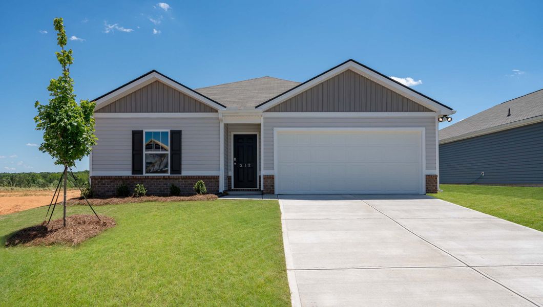 Front exterior of a new home in Gibson Grove, Laurens, SC, highlighting curb appeal (Image 1). Front exterior of a new home in Gibson Grove, Laurens, SC, highlighting curb appeal (Image 1).
