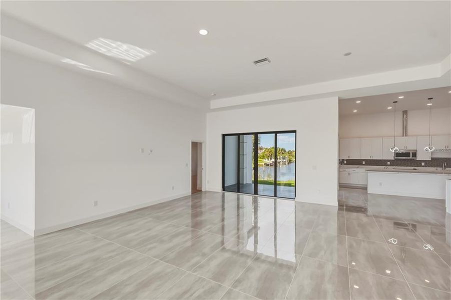 Spacious, unfurnished interior of a new home in , Port Charlotte (Image 26).