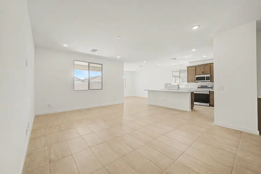 Spacious, unfurnished interior of a new home in The Villages at North Copper Canyon, Surprise (Image 6).