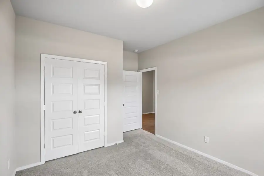Spacious, unfurnished interior of a new home in Sorella, Tomball (Image 19).