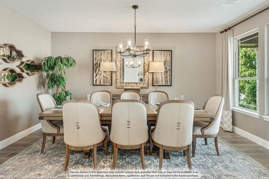 Formal dining room with large wood table, eight upholstered chairs, chandelier, and hardwood floors
