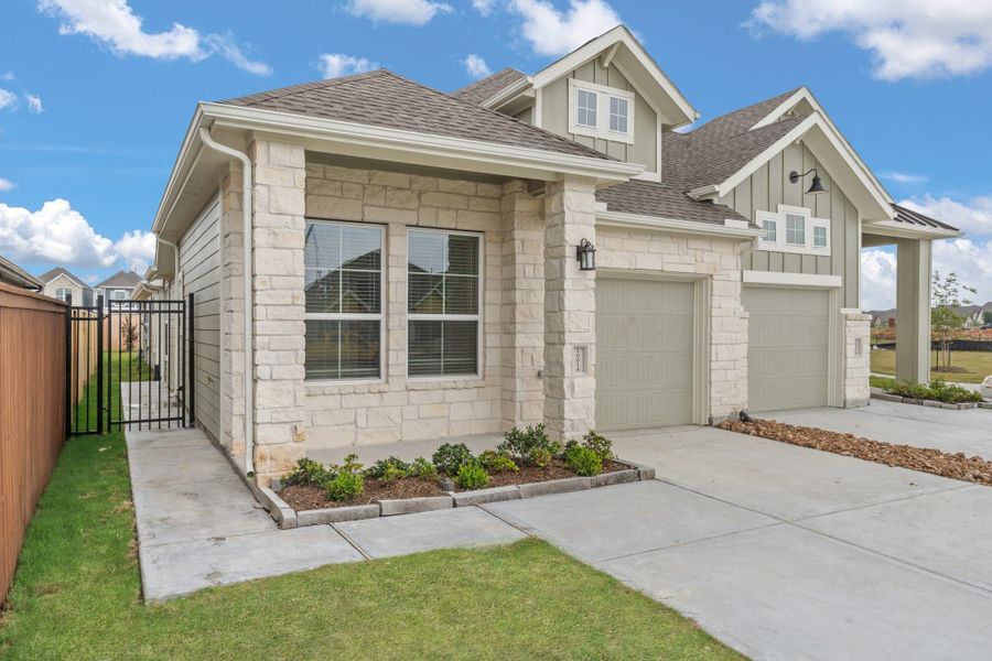 Exterior details and patio area of a home in Meridiana, Manvel (Image 3).