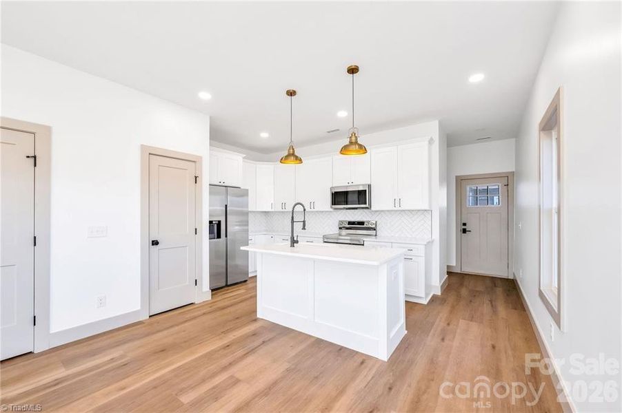 Furnished interior view inside a new home in , Hickory (Image 7).