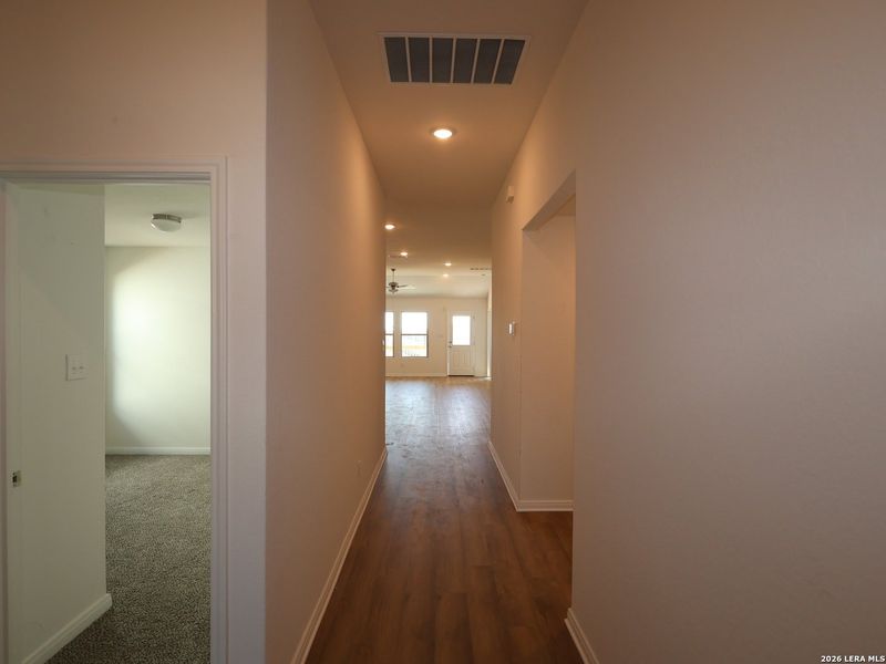 Spacious, unfurnished interior of a new home in Hunters Ranch, San Antonio (Image 33).