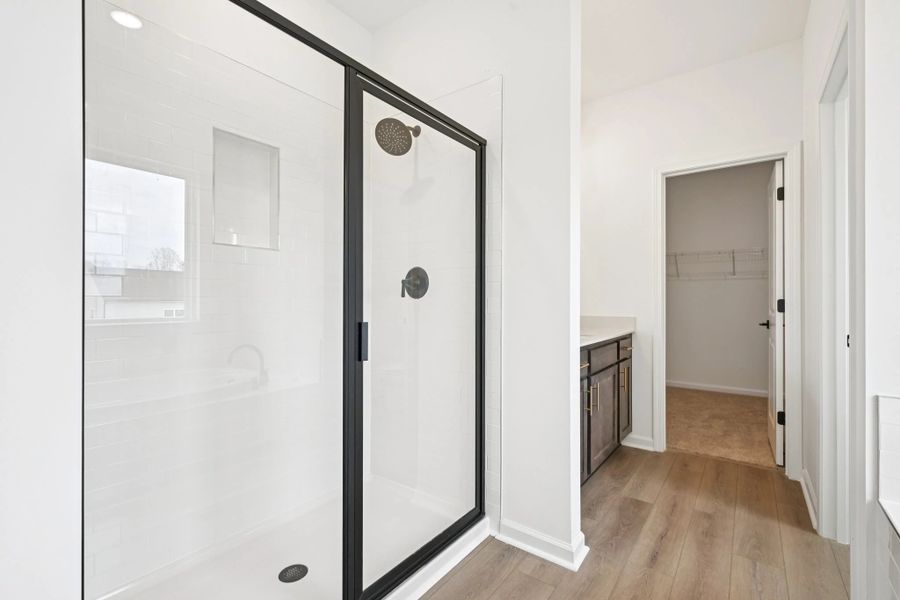 Primary Bath featuring AW Collection® Oxford - Organic textures paired with bold, classic design. Primary Bath featuring AW Collection® Oxford - Organic textures paired with bold, classic design.