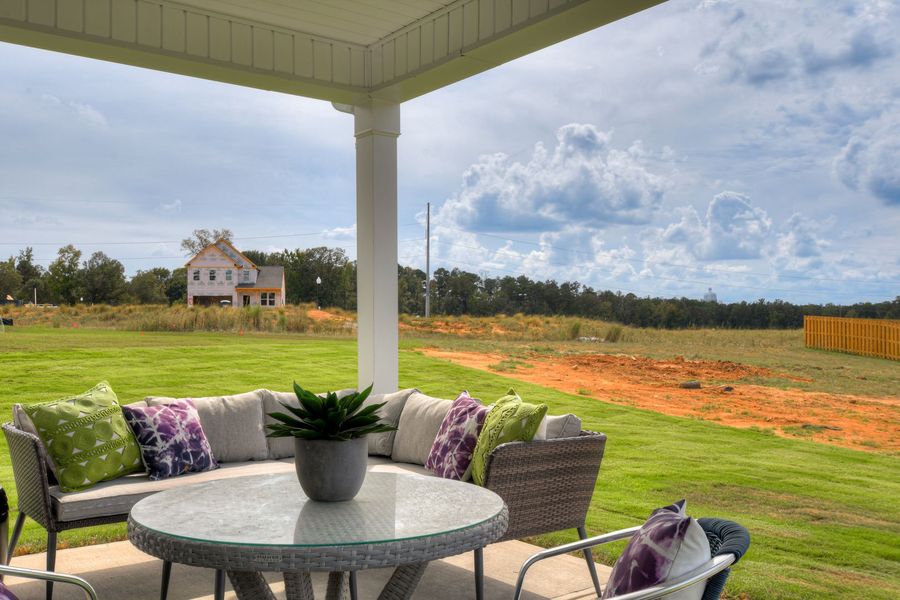 Exterior details and patio area of a home in The Beacon at Old Peachtree Single Family Homes, Lawrenceville (Image 68).