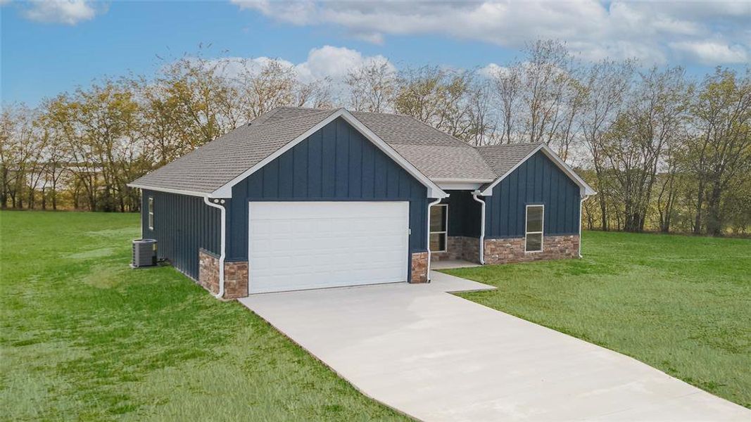 Front exterior of a new home in , Mount Vernon, TX, highlighting curb appeal (Image 20). Front exterior of a new home in , Mount Vernon, TX, highlighting curb appeal (Image 20).