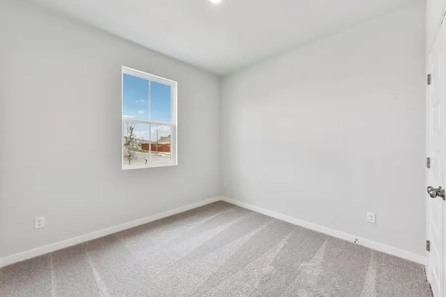 Spacious, unfurnished interior of a new home in Avery Centre, Round Rock (Image 22).