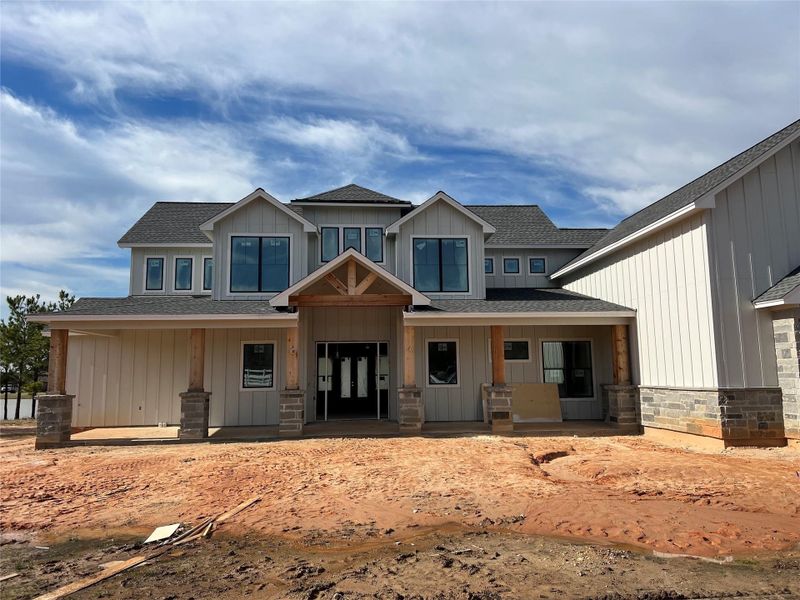 Front exterior of a new home in , Pearland, TX, highlighting curb appeal (Image 8).