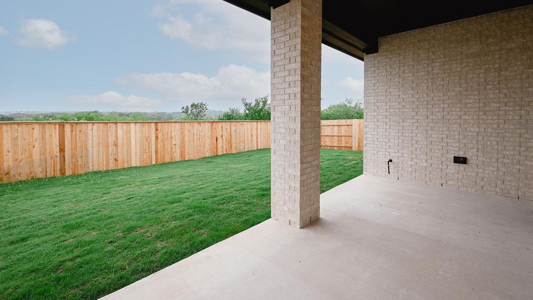Exterior details and patio area of a home in Crosswinds, Kyle (Image 4).