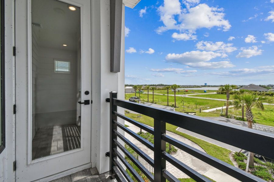 Exterior details and patio area of a home in Emerald Landing at Waterside at Lakewood Ranch – Towns, Sarasota (Image 2). Exterior details and patio area of a home in Emerald Landing at Waterside at Lakewood Ranch – Towns, Sarasota (Image 2).