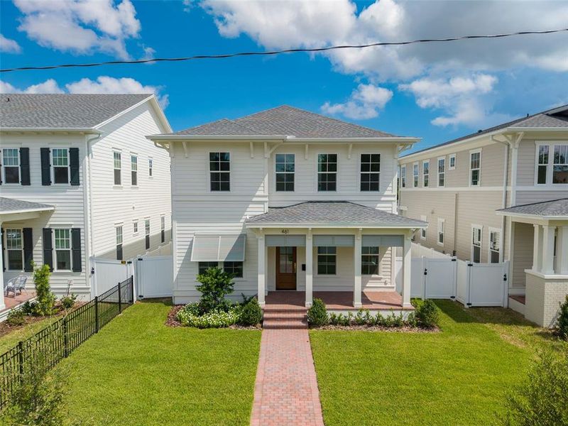 Front exterior of a new home in , St. Petersburg, FL, highlighting curb appeal (Image 27).