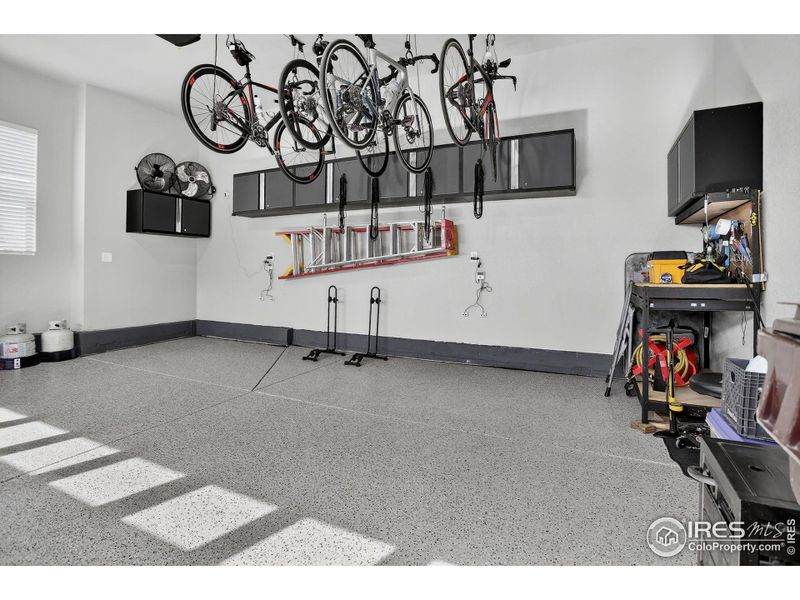 Garage with Epoxy Coating on Floor, cabinets included