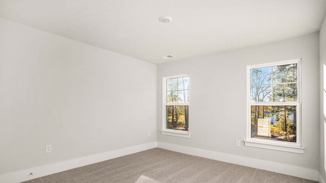 Spacious, unfurnished interior of a new home in Coastal Farms, Conway (Image 14). Spacious, unfurnished interior of a new home in Coastal Farms, Conway (Image 14).