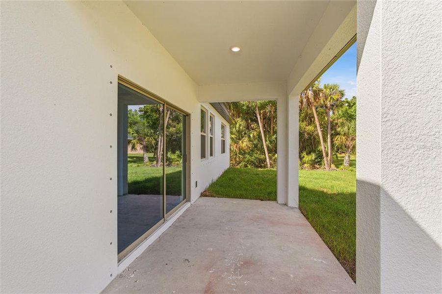 Exterior details and patio area of a home in , North Port (Image 30).
