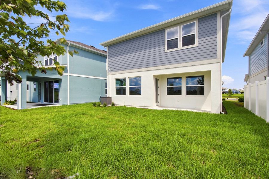 Exterior details and patio area of a home in Persimmon Place – Garden Series, Wesley Chapel (Image 3).