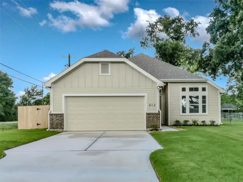 Front exterior of a new home in , Angleton, TX, highlighting curb appeal (Image 1). Front exterior of a new home in , Angleton, TX, highlighting curb appeal (Image 1).