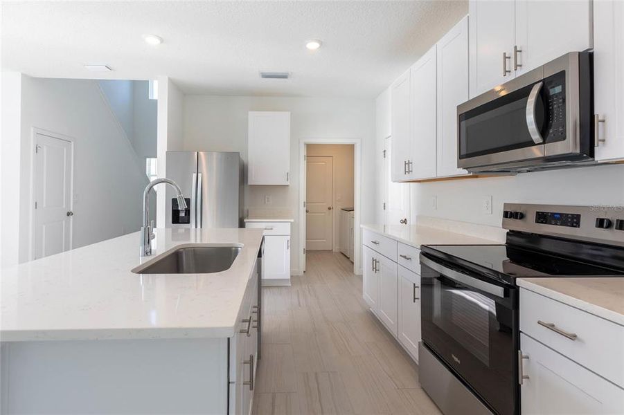Furnished interior view inside a new home in Flagler Village - Classic Series, Palm Coast (Image 7).