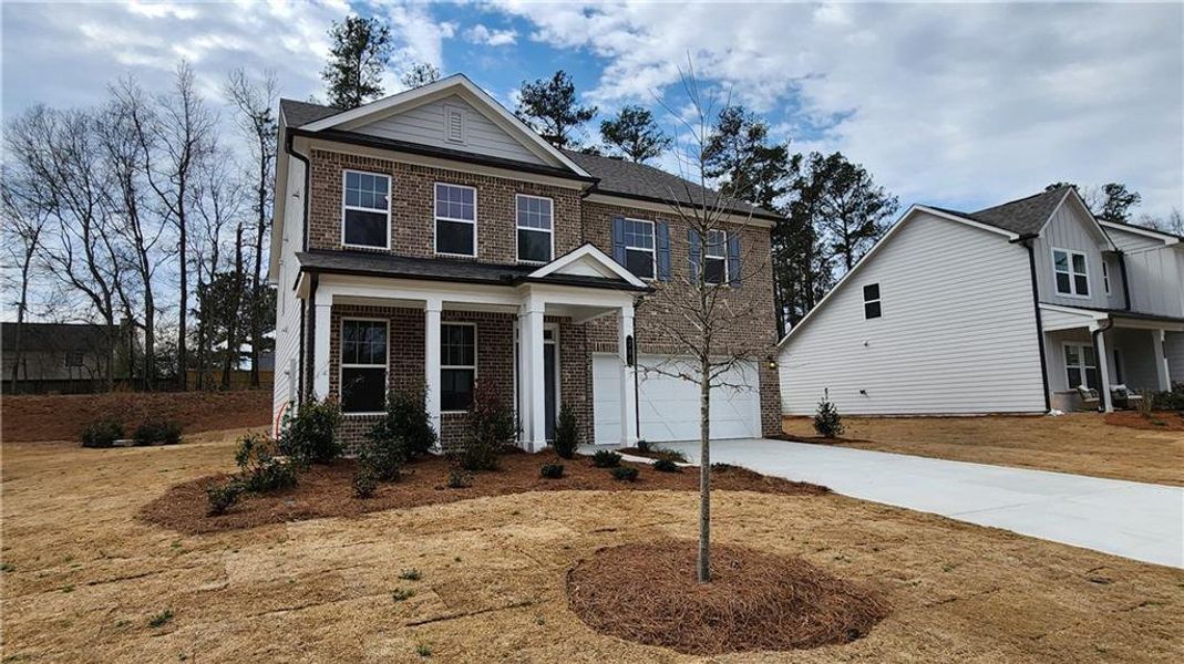 Front exterior of a new home in The Estates at Casteel, Bethlehem, GA, highlighting curb appeal (Image 21).