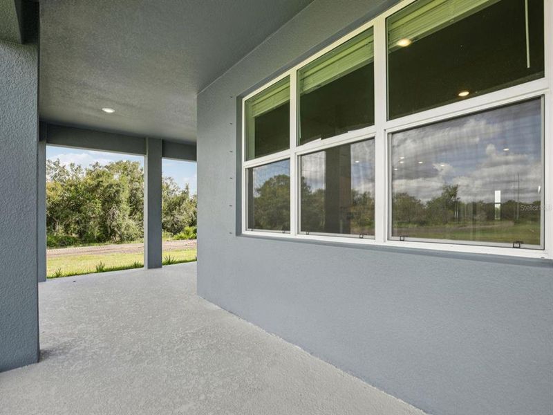 Exterior details and patio area of a home in Coasterra - Reserve Series, Palmetto (Image 2).
