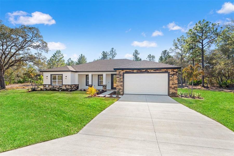 Front exterior of a new home in , Brooksville, FL, highlighting curb appeal (Image 27).