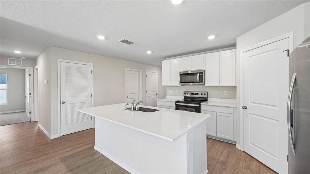 Furnished interior view inside a new home in Oakfield Lakes, Palmetto (Image 5).
