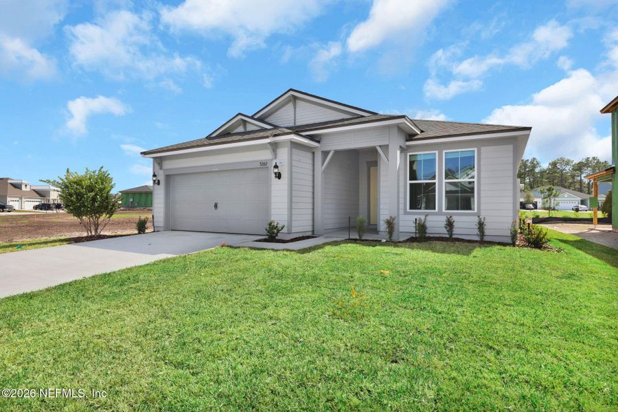 Front exterior of a new home in Hyland Trail, Green Cove Springs, FL, highlighting curb appeal (Image 2). Front exterior of a new home in Hyland Trail, Green Cove Springs, FL, highlighting curb appeal (Image 2).