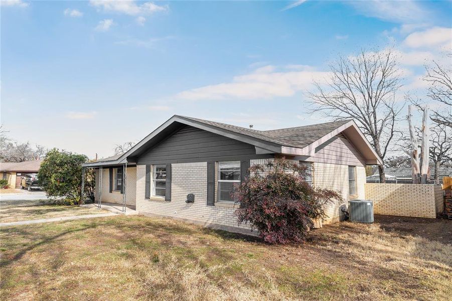 Exterior details and patio area of a home in , Brownwood (Image 24).
