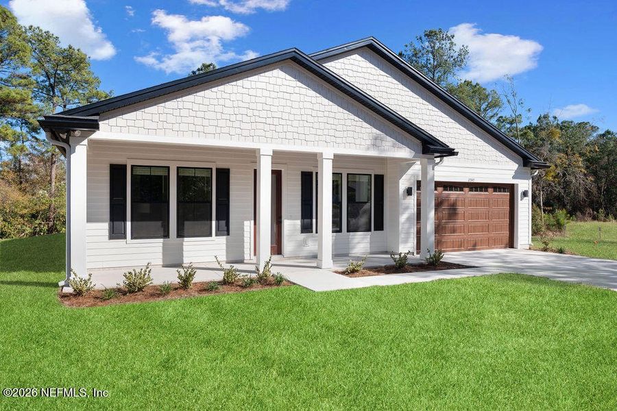 Front exterior of a new home in , Middleburg, FL, highlighting curb appeal (Image 23).