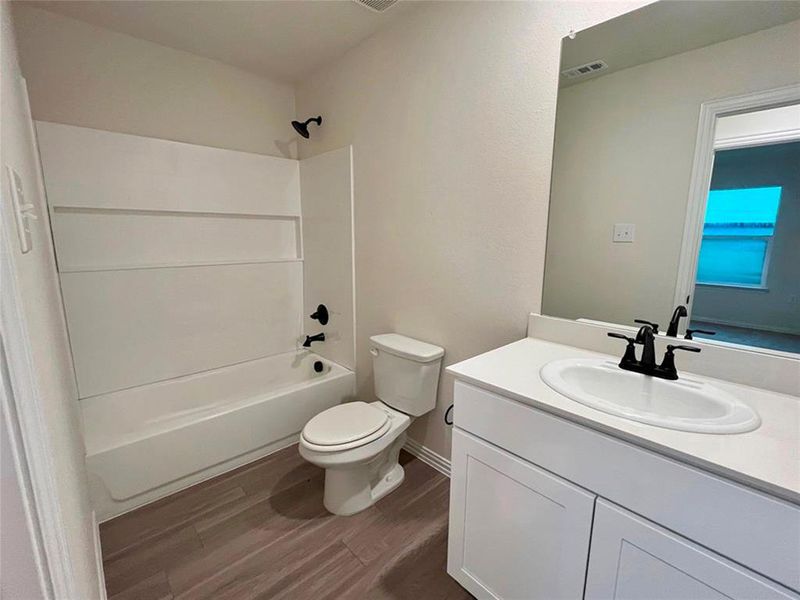 Furnished interior view inside a new home in Labein Villas, Greenville (Image 10).