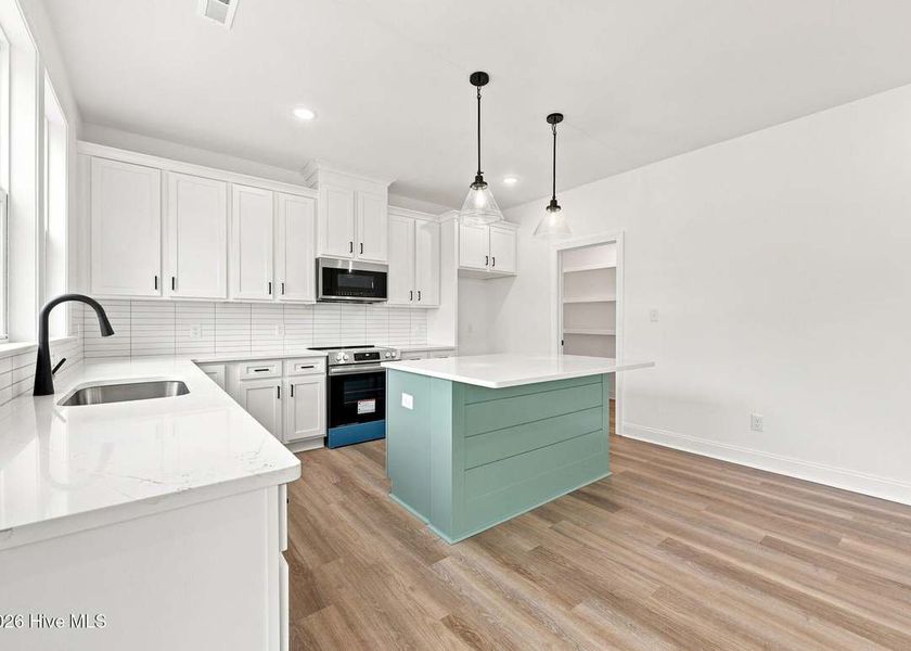 Furnished interior view inside a new home in Dixon Grove, Grimesland (Image 7).