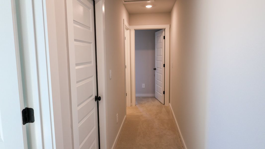 Representative unfurnished interior of a home built from the TISDALE by D.R. Horton in Harvest Point, Spring Hill (Image 49).