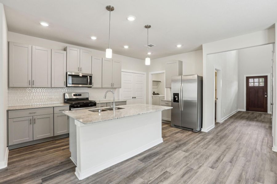 Photo is not of the actual home, but is an inspirational photo of builder’s model home and may depict options, furnishings, and/or decorator features that are not included