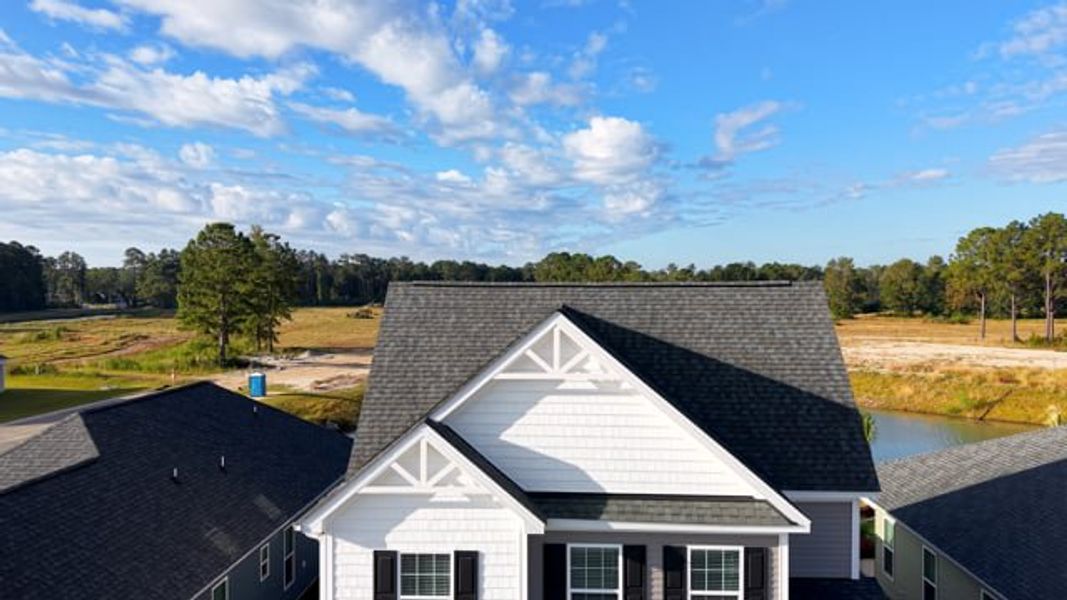 Representative exterior photo of a completed home built from the The Hibiscus by Chesapeake Homes in Coastal Club of the Carolinas, Calabash, NC (Image 28).