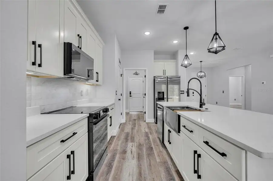 Furnished interior view inside a new home in , Kissimmee (Image 17).
