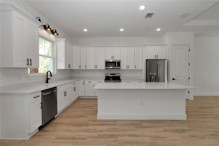 Furnished interior view inside a new home in , Dunnellon (Image 14).
