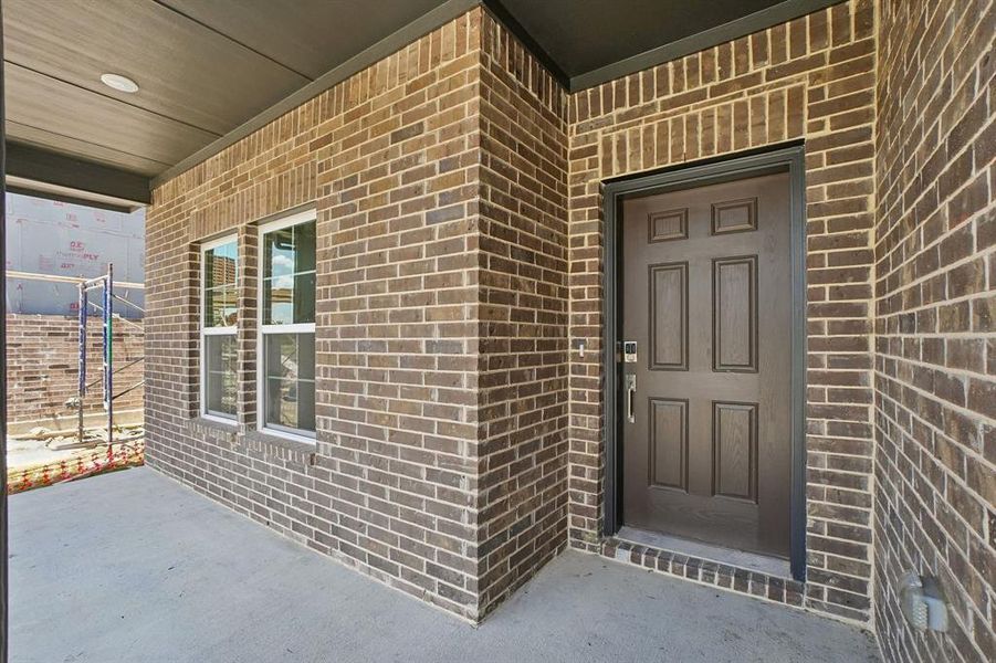 Exterior details and patio area of a home in Overland Grove, Forney (Image 17).