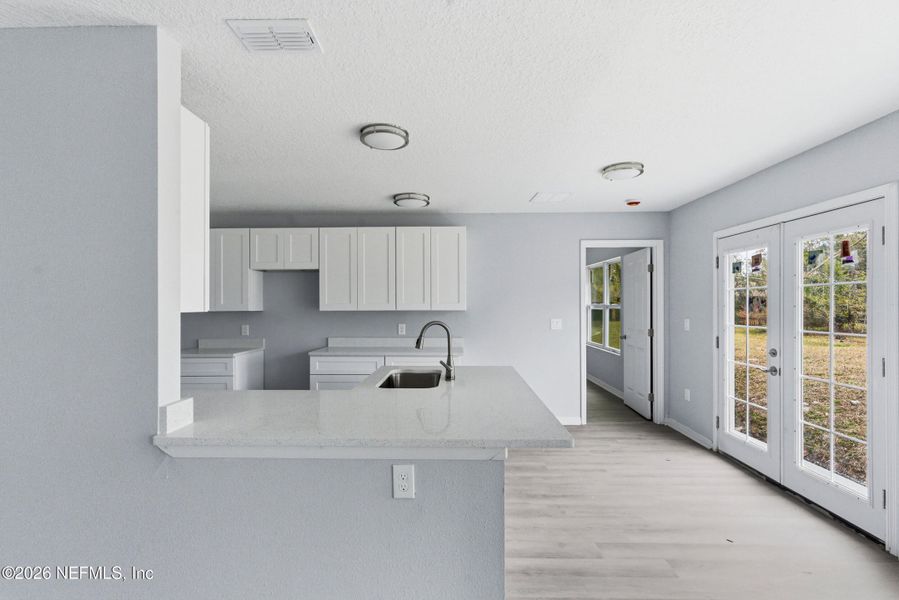 Furnished interior view inside a new home in , Jacksonville (Image 7). Furnished interior view inside a new home in , Jacksonville (Image 7).